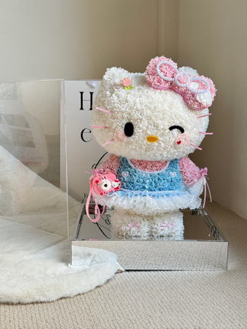 Holding A Camera And Standing with Hello Kitty Everlasting Flowers